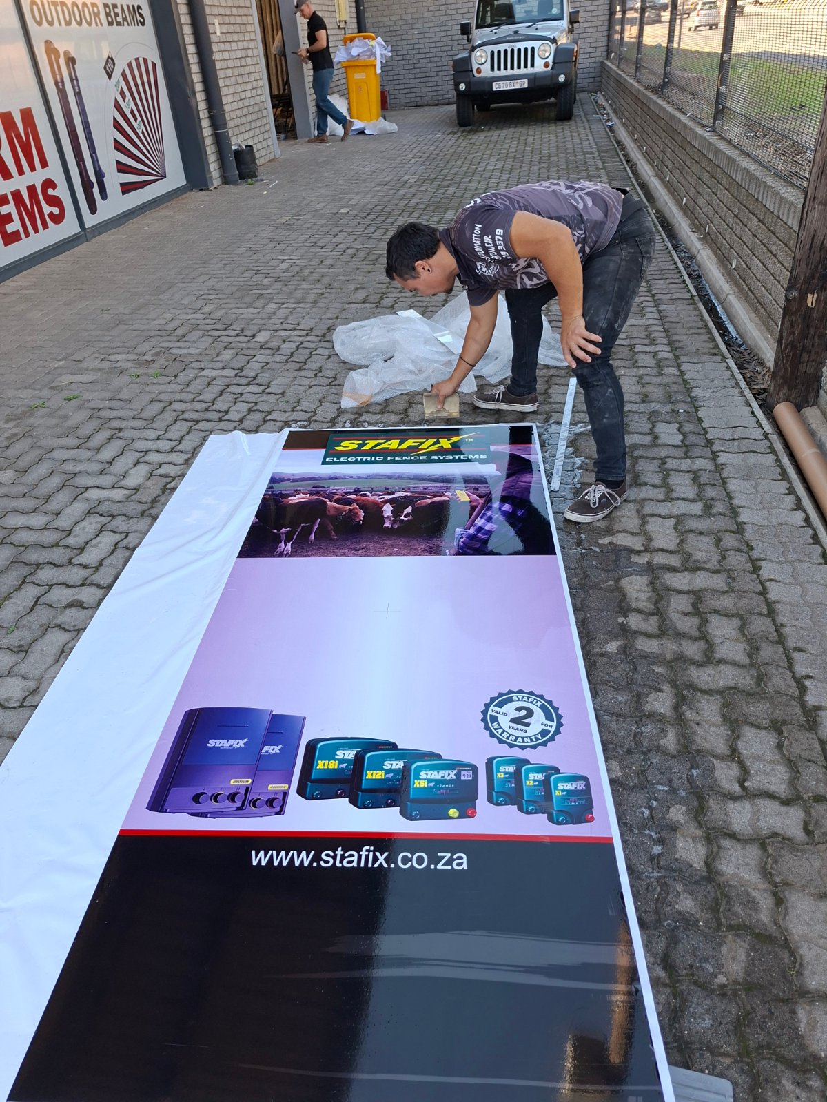 Laying out printed vinyl banner