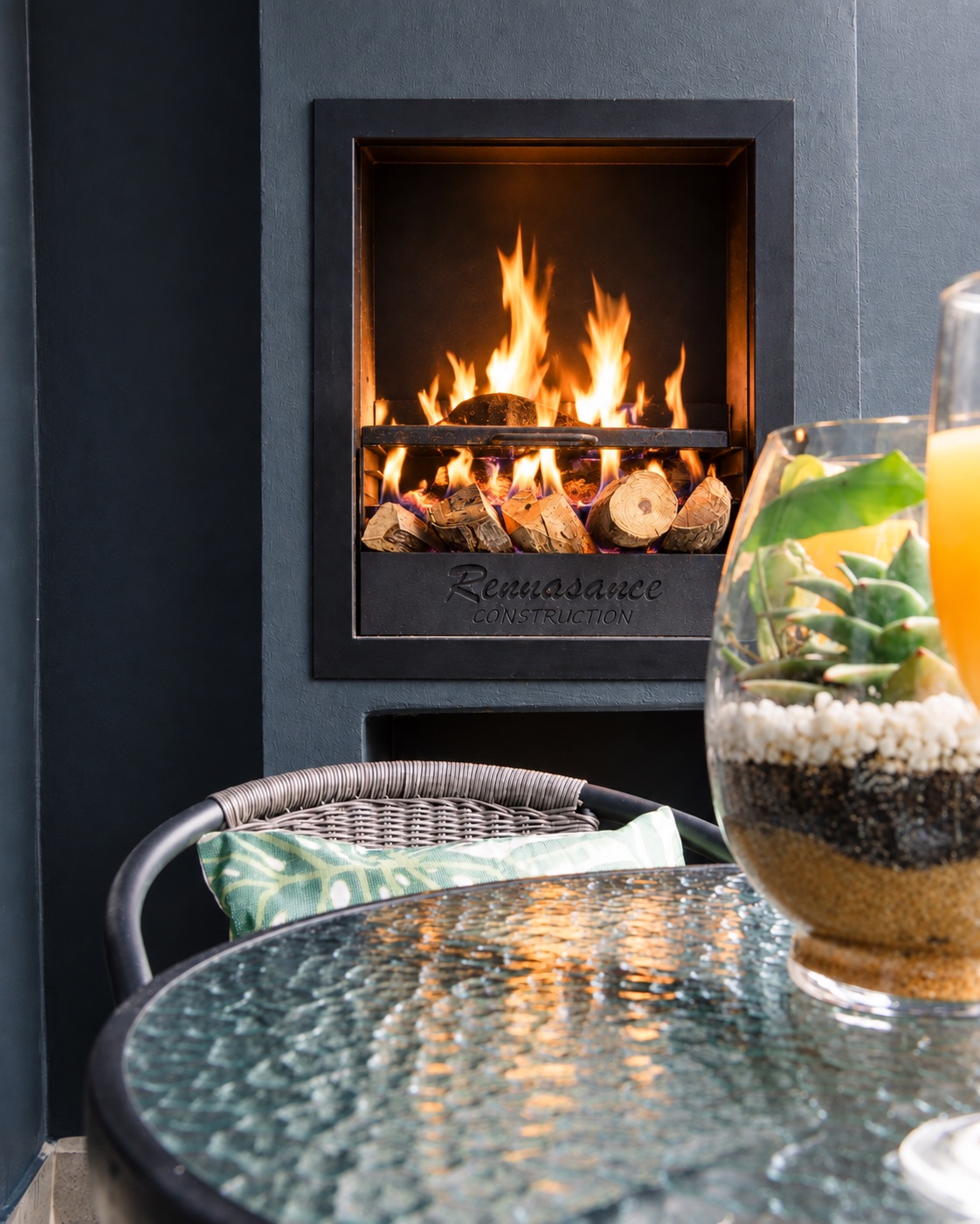 Cosy outdoor fireplace and braai corner