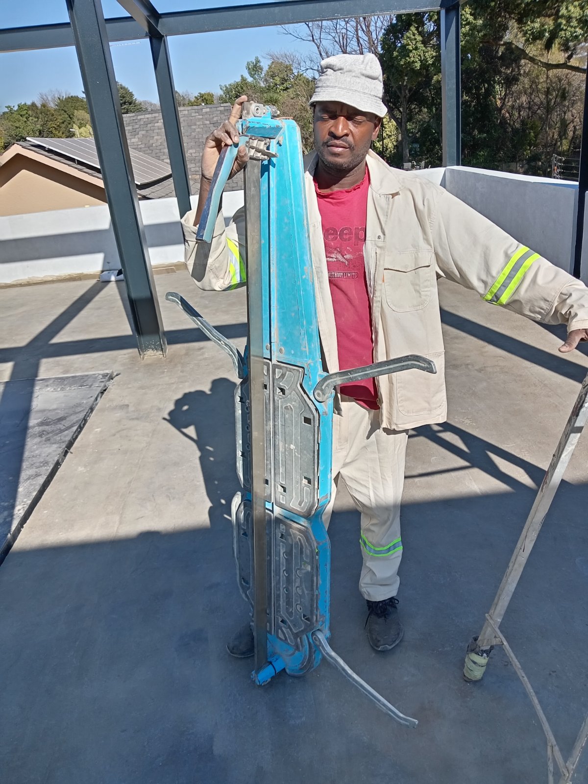 Stanley with tile cutting equipment on site