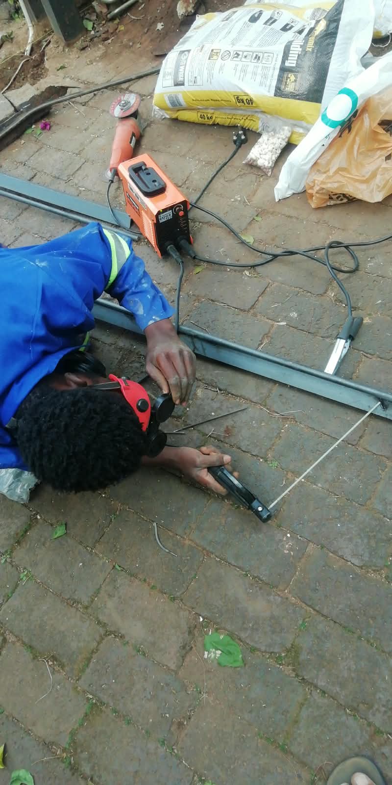 Welder working on a steel section