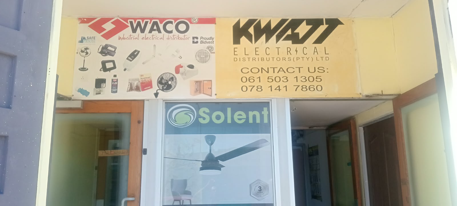 Kwatt Electrical shopfront sign with Waco and Solent signage above the entrance
